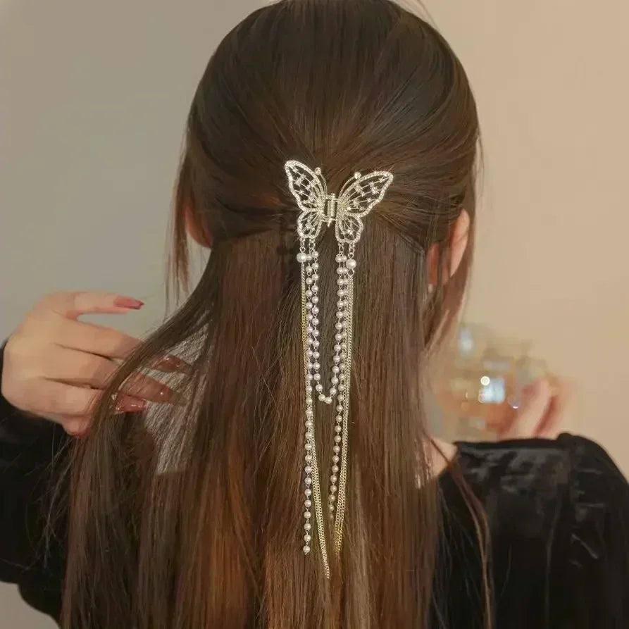 Beautiful women's metal hairpin with a butterfly