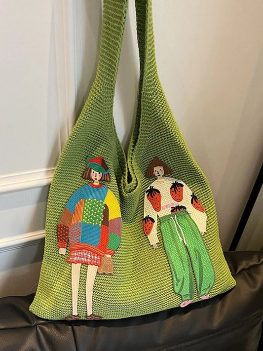 Green knitted bag with embroidered designs of people on a white background